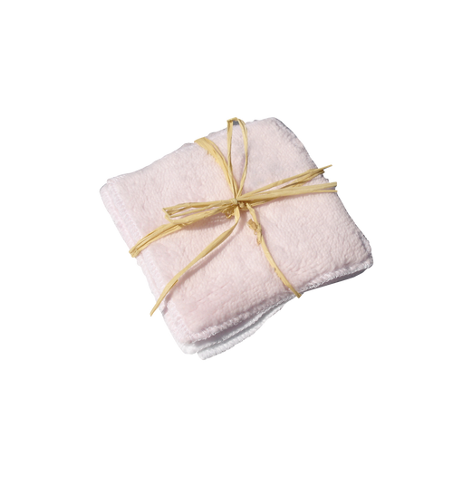multiples lingettes blanche et rose avec un noeud de raphia